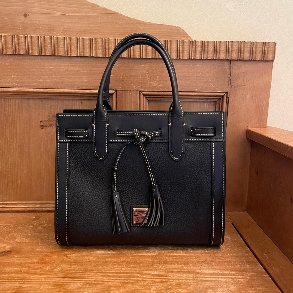 Tasseled top-handle bag, only used a handful of times. In like-new condition.